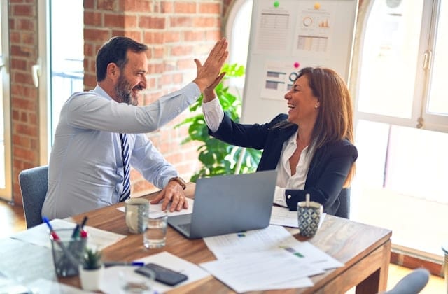 Photographe corporate — équipe en réunion