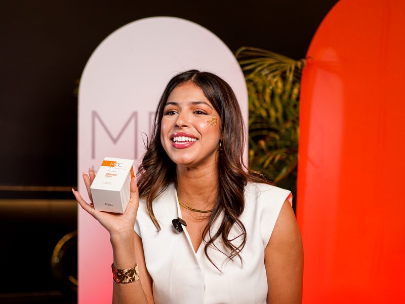 Portrait photography in Morocco — Woman holding a skincare product